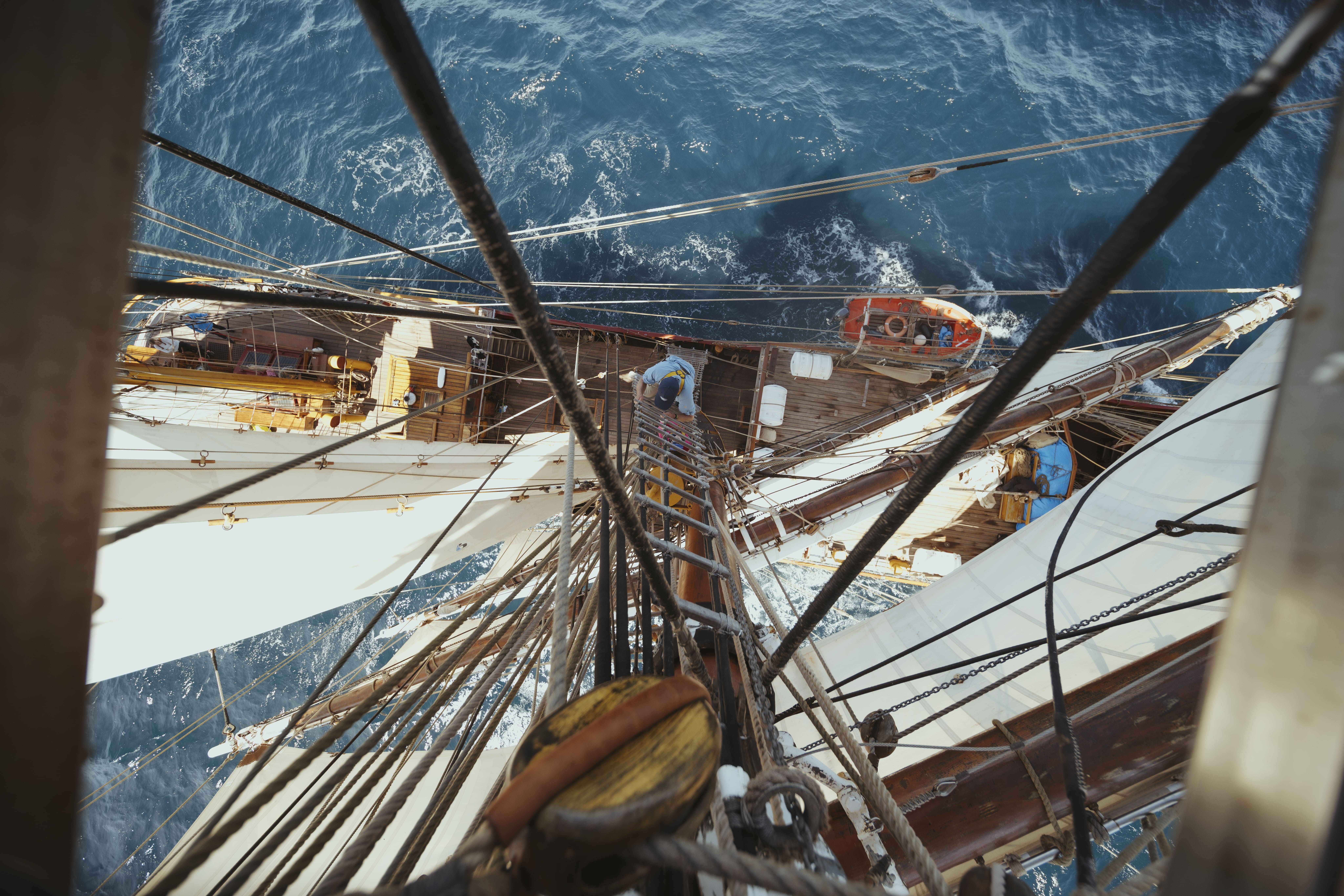 Looking down from the mast of Bark EUROPA, deck and ocean below
